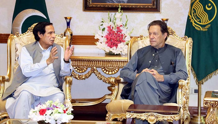 PTI President Chaudhry Parvez Elahi exchanging views with party chief Imran Khan during meeting held at CM Office in Lahore on Monday, September 26, 2022.