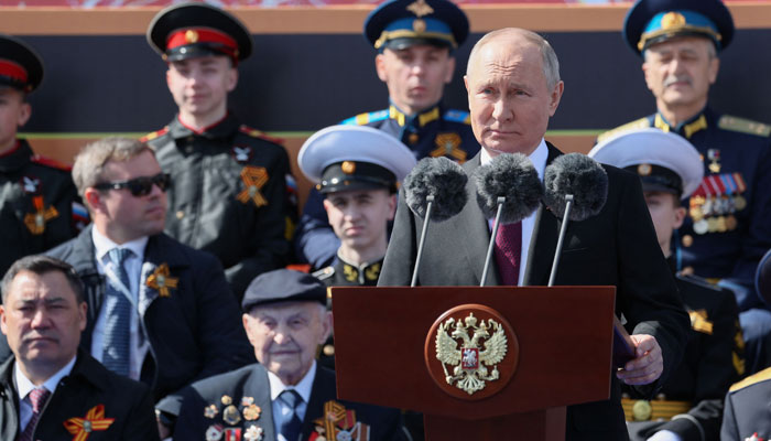 Russian President Vladimir Putin gives a speech during the Victory Day military parade at Red Square in central Moscow on May 9, 2023. — AFP