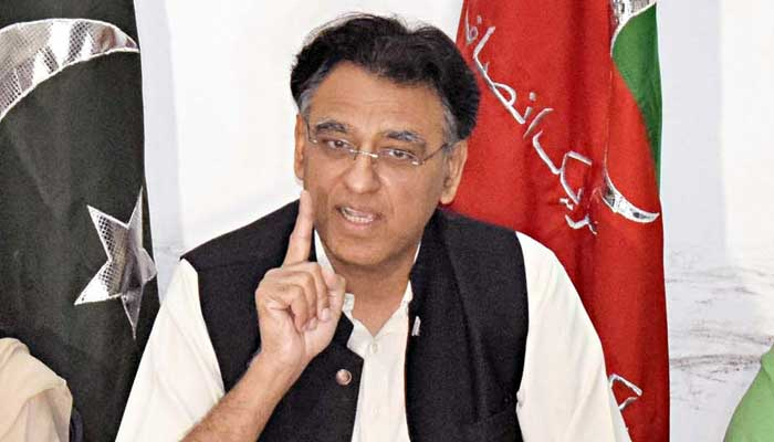 PTIs leader Asad Umar addresses media persons during press conference in Lahore on September 14, 2022. — PPI/File