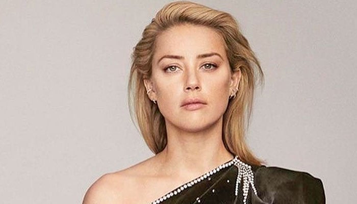 Pic: Amber Heard seen for first time since moving to Spain