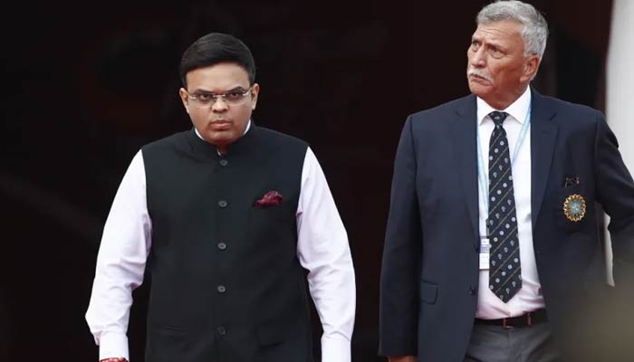 BCCI secretary Jay Shah (left) and president Roger Binny walk out during the first match of the India vs Australia series on May 9, 2023. — BCCI