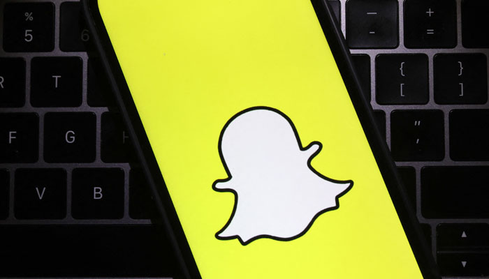 This photo shows the Snapchat logo on a cell phone screen in San Anselmo, California. — AFP/File