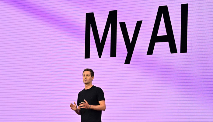 Evan Spiegel, founder and CEO of Snapchat, speaks at the 2023 Snap Partner Summit at the Barker Hangar in Santa Monica, California, on April 19, 2023, where the focus was on immersive augmented reality experiences and tech for people attending music concerts. — AFP