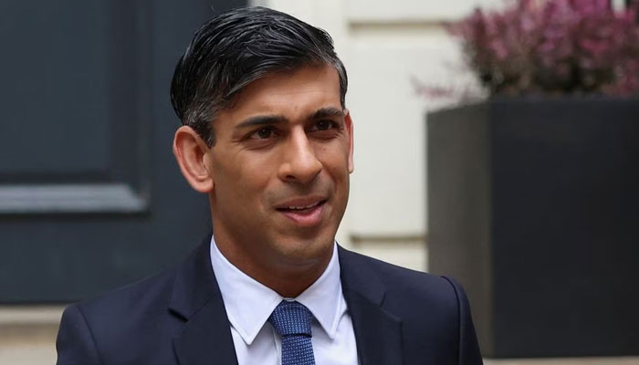 Britain’s Prime Minister Rishi Sunak leaves his campaign headquarters after addressing his supporters, in London, Britain, May 5, 2023. — Reuters