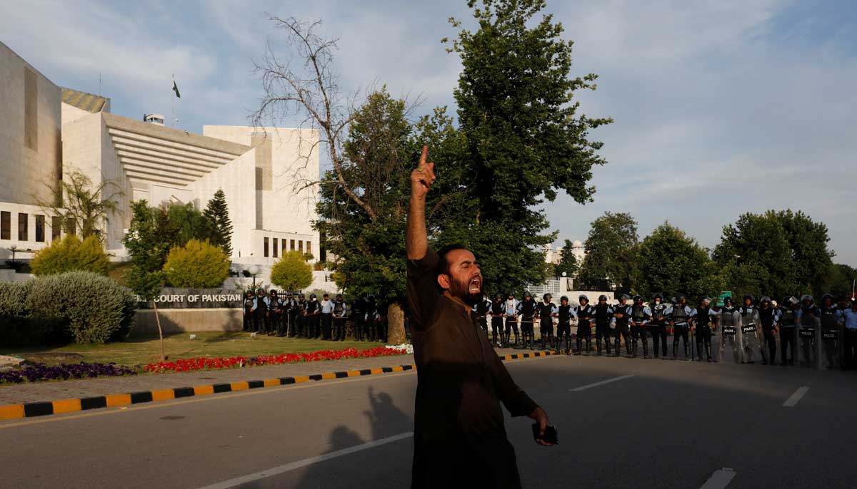 A supporter of Pakistans former Prime Minister, Imran Khan, chants slogans, as he appeared before the Supreme Court in Islamabad, Pakistan May 11, 2023