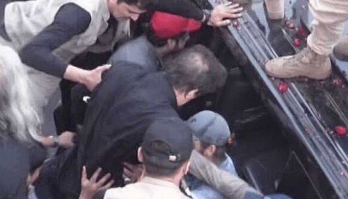 PTI chief Imran Khan being shifted to another vehicle after surviving an assassination attack in Wazirabad on November 3, 2022. — Saudi Gazette