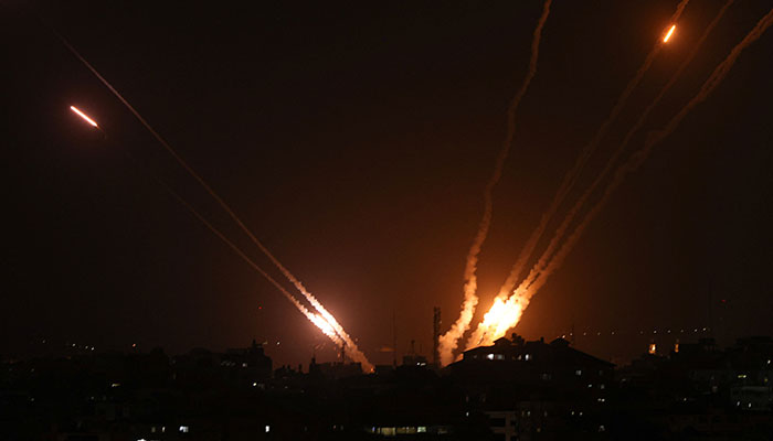 Rockets are fired from Gaza City towards Israel on May 13, 2023. Israeli air strikes battered Gaza again on May 13 in response to rocket fire from militants as deadly fighting resumed after a night of relative calm, despite efforts to secure a truce. —AFP