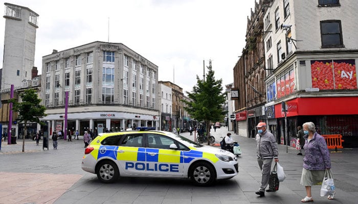 A UK police vehicle can be seen in this picture. — AFP/File