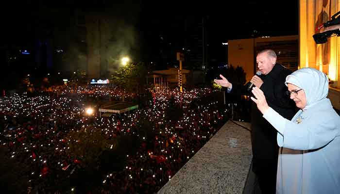 Turkish President Tayyip Erdogan, accompanied by his wife Emine Erdogan, addresses his supporters at the AK Party headquarters in Ankara, Turkey May 15, 2023. — Reuters