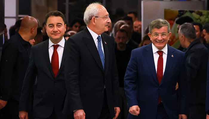 Kemal Kilicdaroglu, presidential candidate of Turkeys main opposition alliance, DEVA Party leader Ali Babacan and Gelecek (Future) Party leader Ahmet Davutoglu walk at the Republican Peoples Party (CHP) headquarters on election night in Ankara, Turkey May 15, 2023. — Reuters