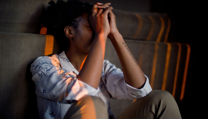 A person can be seen sitting upset. — Pixabay/File