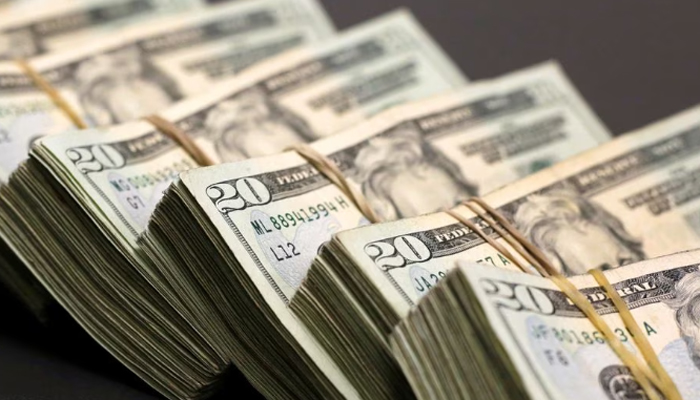 Bundles of US dollar banknotes are pictured at a currency exchange shop in Ciudad Juarez, Mexico, on January 15, 2018. — Reuters