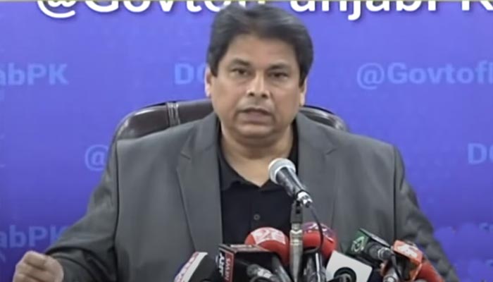 Caretaker Information Minister Aamir Mir addressing a press conference. — Screengrab/Geo News