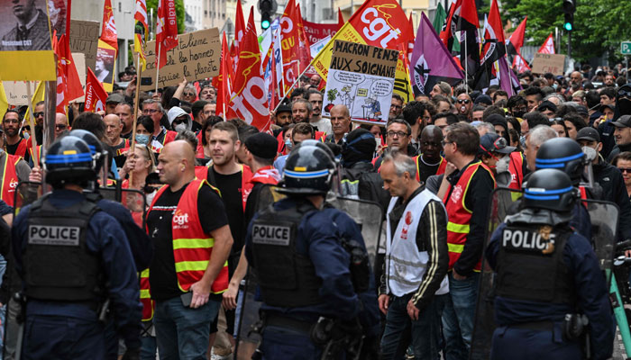 French riot police form a cordon as protesters and CGT labour union members attend a demonstration against Frances pension reform, on May 8, 2023. — AFP