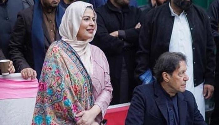 An undated image of PTI Senior Vice President Fawad Chaudhrys wife Hiba Fawad (L) with party chief Imran Khan. — Twitter/@HibaFawadPk