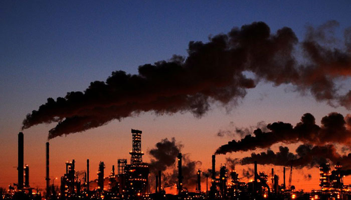 Petro-Canadas Edmonton Refinery and Distribution Centre glows at dusk in Edmonton. — Reuters/File