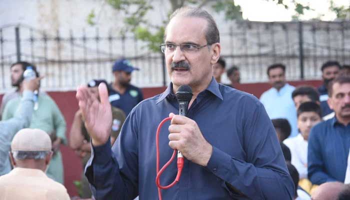 PTI leader Aamer Mehmood Kiani addressing a press conference. — Twitter/@AmerkianiPti