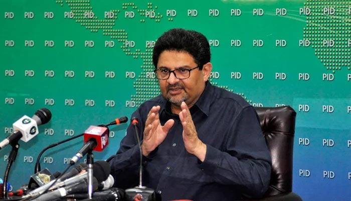 Former finance minister Miftah Ismail addressing a press conference in this undated image. — PID