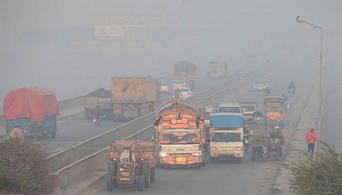 Vehicles drive amid thick smog in Lahore, Pakistan, November 24, 2021. — Reuters/File