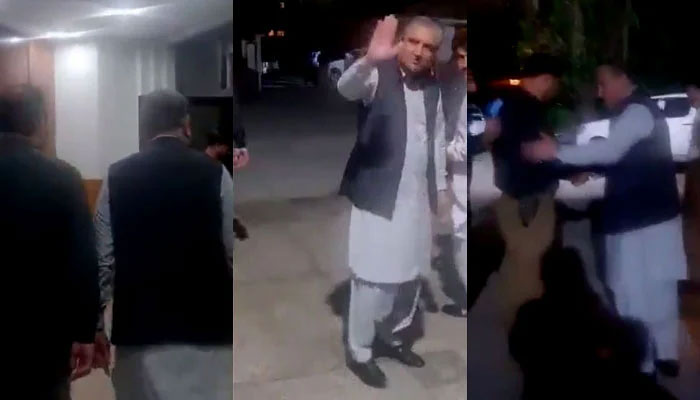 PTI Vice Chairman Shah Mahmood Qureshi being taken by authorities after being arrested under MPO. —  Screengrab/YouTube/PTI