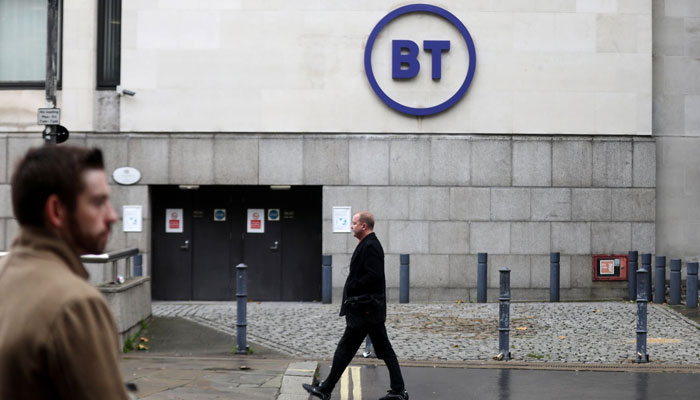 People walk past British Telecom (BT) headquarters in London, Britain. — Reuters/File