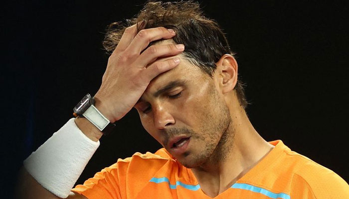Spains Rafael Nadal looks dejected after losing his second round match against Mackenzie Mcdonald of the US. — Reuters/File