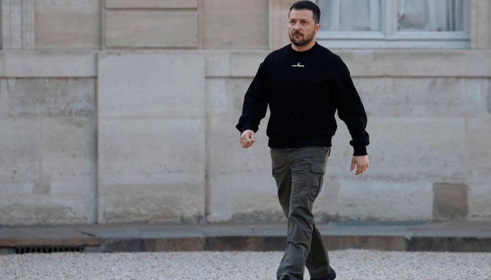 Ukraines President Volodymyr Zelensky arrives at the Elysee presidential palace prior to a meeting with the French president in Paris on May 14, 2023. — AFP