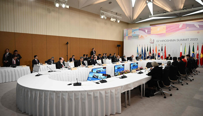 US President Joe Biden, Japans Prime Minister Fumio Kishida and other world leaders take part in a Partnership for Global Infrastructure and Investment event during the G7 Leaders Summit in Hiroshima on May 20, 2023. — AFP