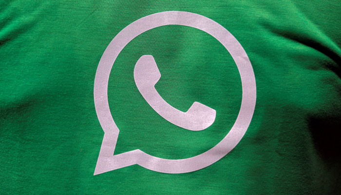 A logo of WhatsApp is pictured on a T-shirt worn by a WhatsApp-Reliance Jio representative during a drive by the two companies to educate users, on the outskirts of Kolkata, India, October 9, 2018. — Reuters