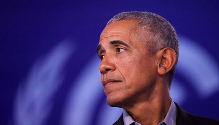 US former President Barack Obama looks on during the UN Climate Change Conference (COP26), in Glasgow, Scotland, Britain, November 8, 2021. —Reuters