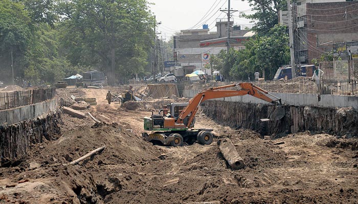 A view of construction work at Samanabad underpass in Lahore on May 16, 2023. — APP