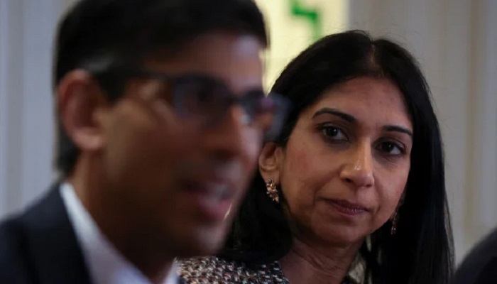 Suella Braverman, Home Secretary of UK, looks as Prime Minister Rishi Sunak speaks to an audience. — AFP/File