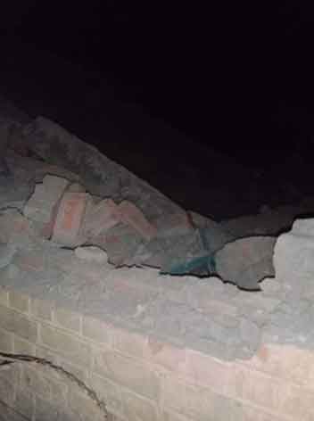Damaged wall of the Government Middle School in Musakki village seen in this photo provided by reporter.