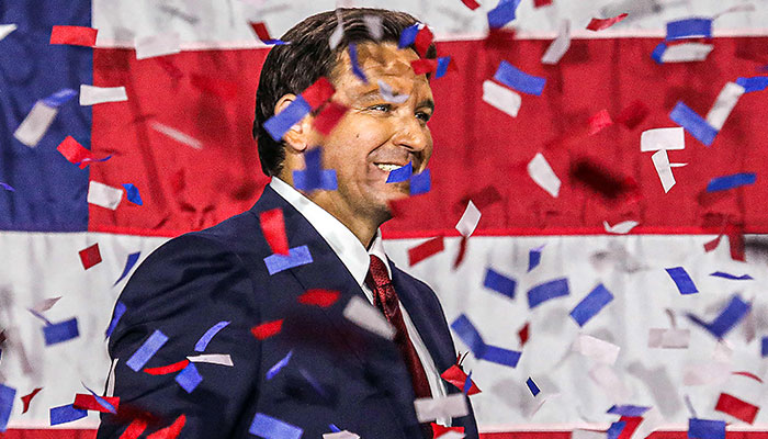 Republican gubernatorial candidate for Florida Ron DeSantis walks onstage during an election night watch party at the Convention Center in Tampa, Florida, on November 8, 2022.—AFP