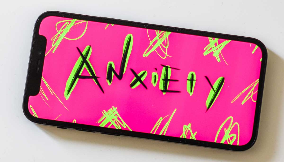 A representational image of an illustration of the word anxiety on a smartphone. — Unsplash