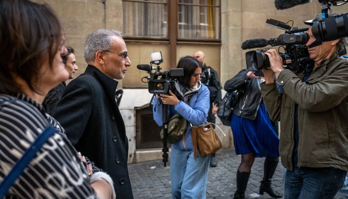 Swiss leading Islamic scholar Tariq Ramadan leaves the Geneva courthouse on May 15, 2023. — AFP