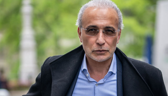Swiss leading Islamic scholar Tariq Ramadan arrives at the Geneva courthouse on May 24, 2023, for the verdict of his trial for rape and sexual coercion in a case dating back 15 years. — AFP
