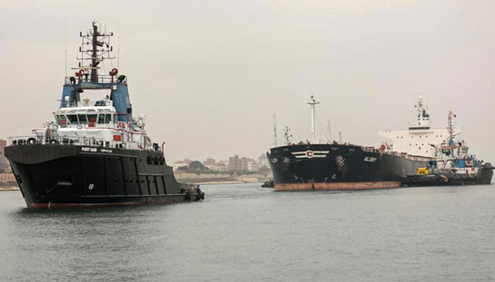 The picture shows a tugboat pulling the Marshall Islands-flagged bulk carrier M/V Glory in the Suez Canal near al-Qantarah between Port Said and Ismailia. — AFP/File