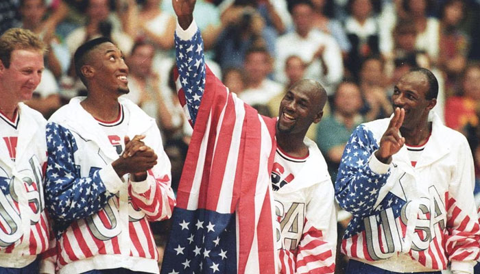 US basketball player Michael Jordan (2nd R) flashes a victory sign as he stands with team mates Larry Bird (L), Scottie Pippen and Clyde Drexler (R), nicknamed the Dream Team after winning the Olympic gold in Barcelona, Spain on August 8, 1992. — Reuters