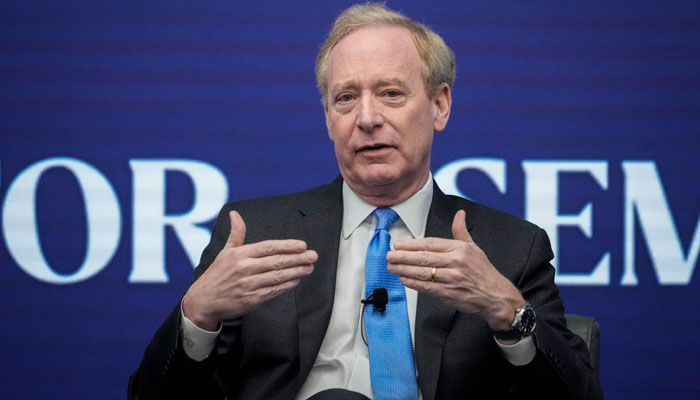 Microsoft vice chair and president Brad Smith speaks at the Semafor World Economic Summit on April 12, 2023, in Washington, DC. — AFP
