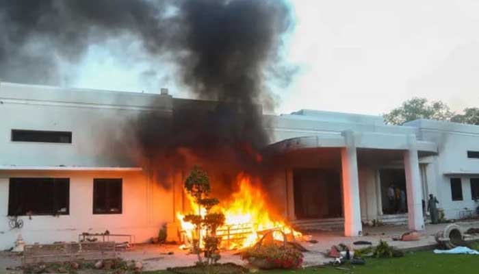 A view of a house in cantonment area, which was set afire by supporters of former prime minister Imran Khan during a protest against his arrest, in Lahore, Pakistan May 9, 2023. — Reuters