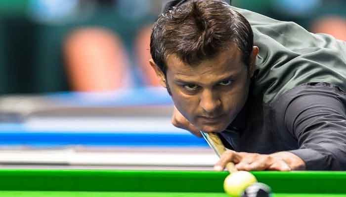 Mohammad Bilal plays a shot in snooker. — Provided by author