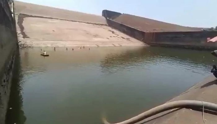Indian official who drained entire dam to retrieve telephone suspended 2 A view of the dam from which 4.1 million litres of water was pumped out to find the phone of Indian official Rajesh Vishwas. —Screengrab from a video
