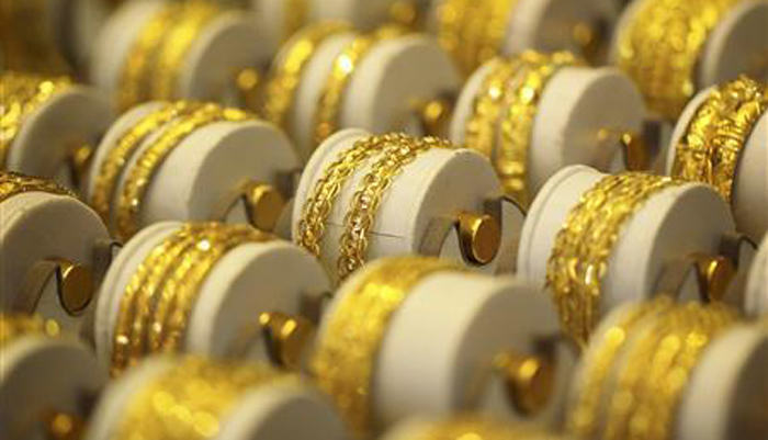 Gold bangles are displayed at a store in this undated file photo. — Reuters