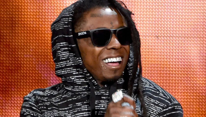 Lil Wayne provides lunch to WGA strikers outside Warner Bros