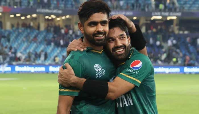 Pakistan all-format skipper Babar Azam hugs wicketkeeper-batter Mohammad Rizwan on October 26, 2022 after the Men in Green defeated arch-rivals India by 10 wickets. — Twitter/@TheRealPCB