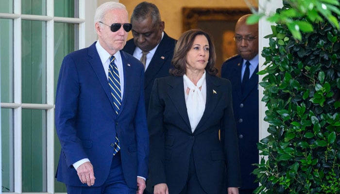 US President Joe Biden (L), Vice President Kamala Harris (R) and Defense Secretary Lloyd Austin (C) make their way to the Rose Garden of the White House, in Washington, DC, May 25, 2023. — AFP