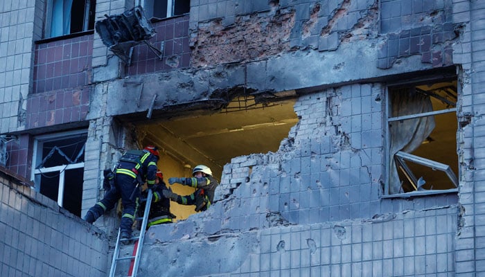 Rescuers work at a site of a building damaged during a Russian suicide drone strike, amid Russias attack on Ukraine, in Kyiv, Ukraine May 28, 2023. — Reuters