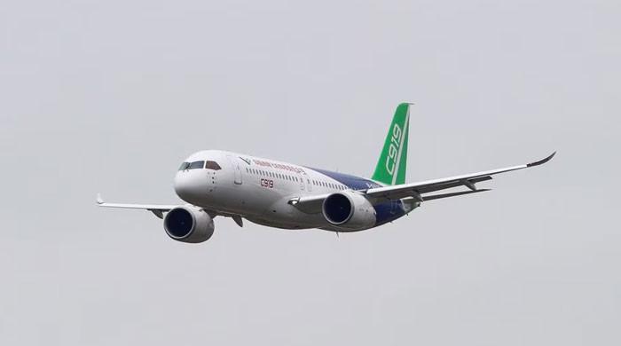First China-made passenger jet debuts to challenge Being, Airbus