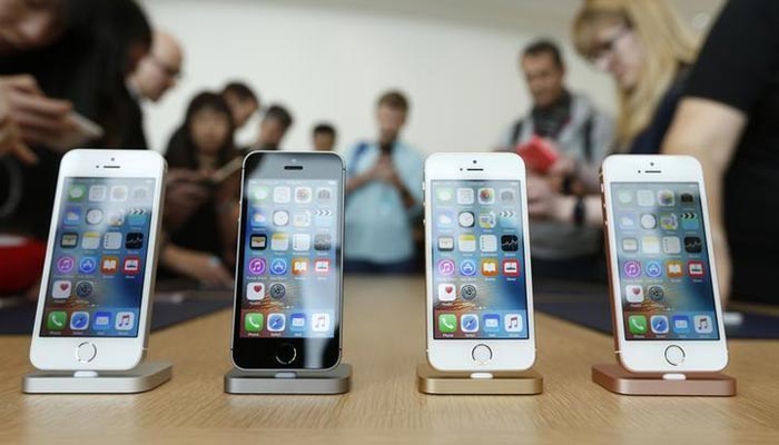 The new iPhone SE is seen on display during an event at the Apple headquarters in Cupertino, California March 21, 2016. — Reuters